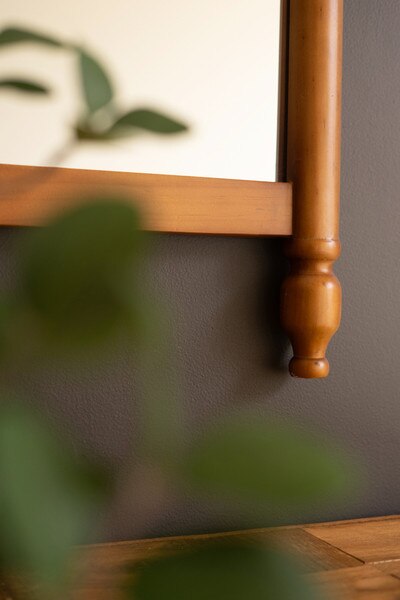 Wood Framed Mirror With Finials